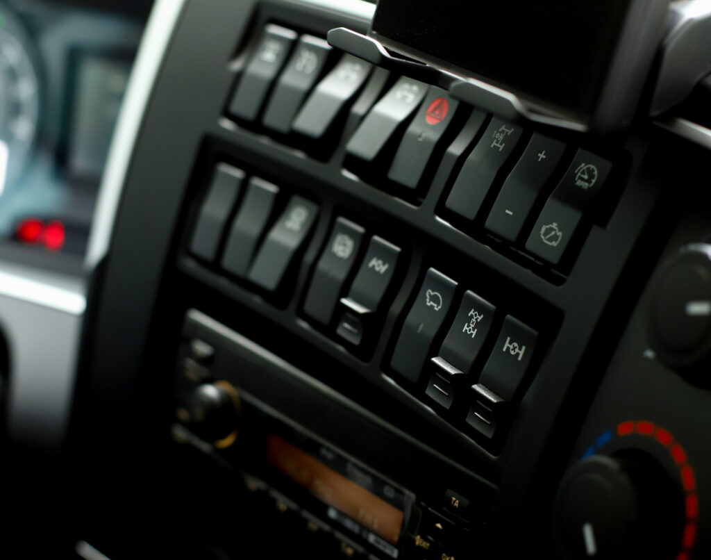 medium-vecteezy_a-panel-instrument-with-many-buttons-on-the-panel-of-a-large_69225018_medium