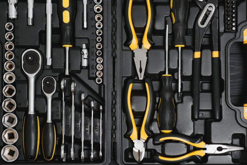 Set of tools for car repair in box, closeup